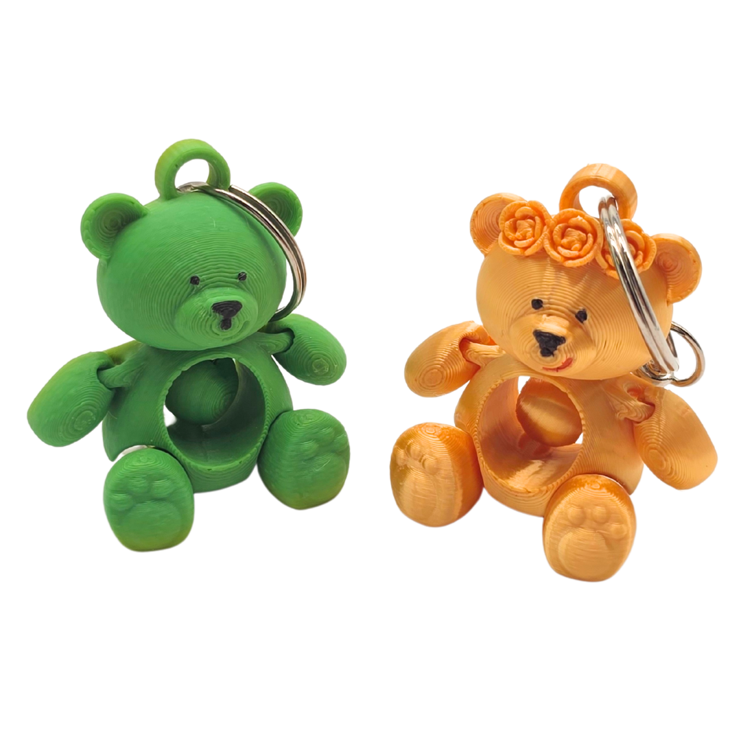 Kleine Bärchen die bewegliche Pfoten sowie ein Bewegliches Herz haben. Es sind Schlüsselanhänger.