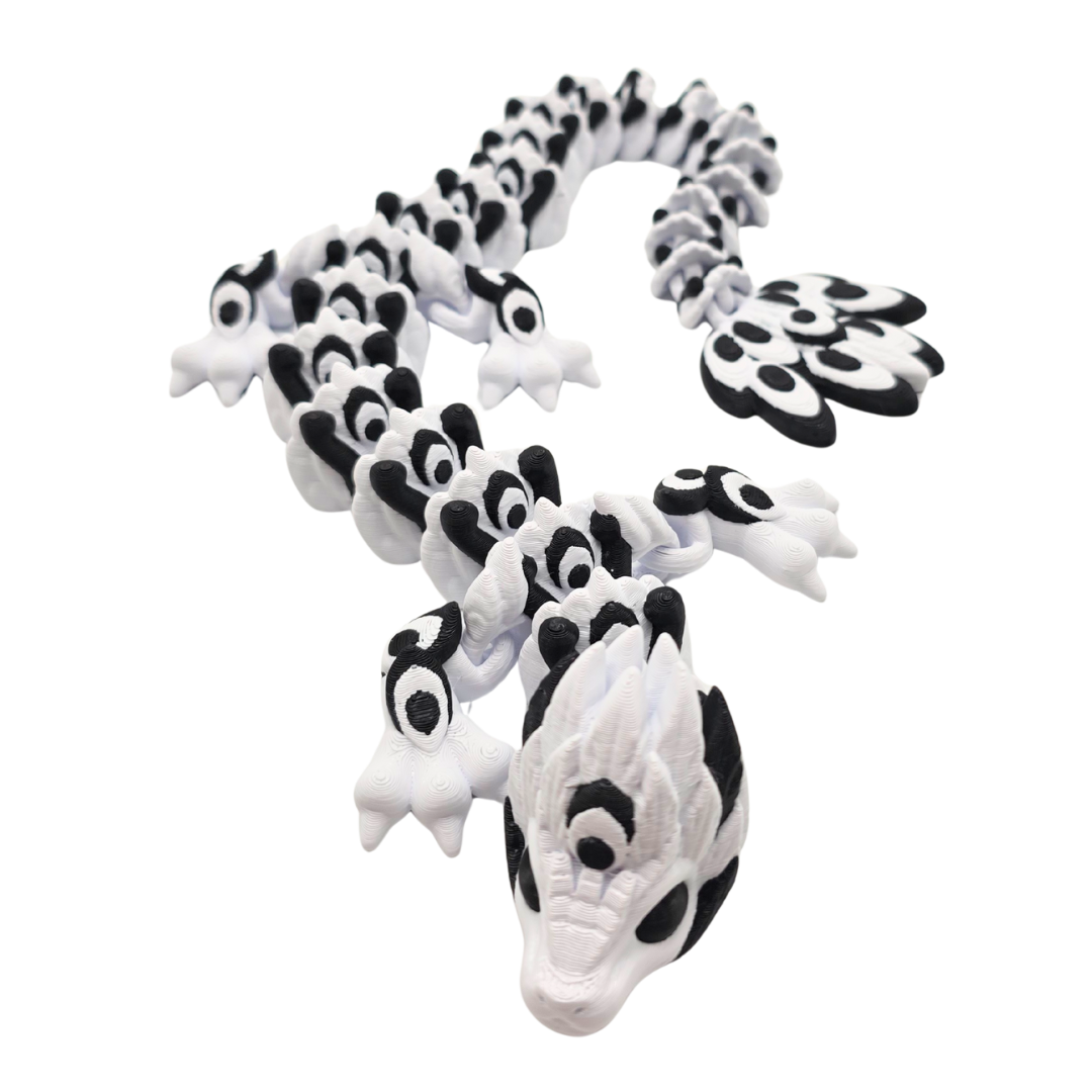 Ein Drache der zweifarbig ist und an die Göttin Hera erinnert. Hera ist die Göttin der Ehe. 